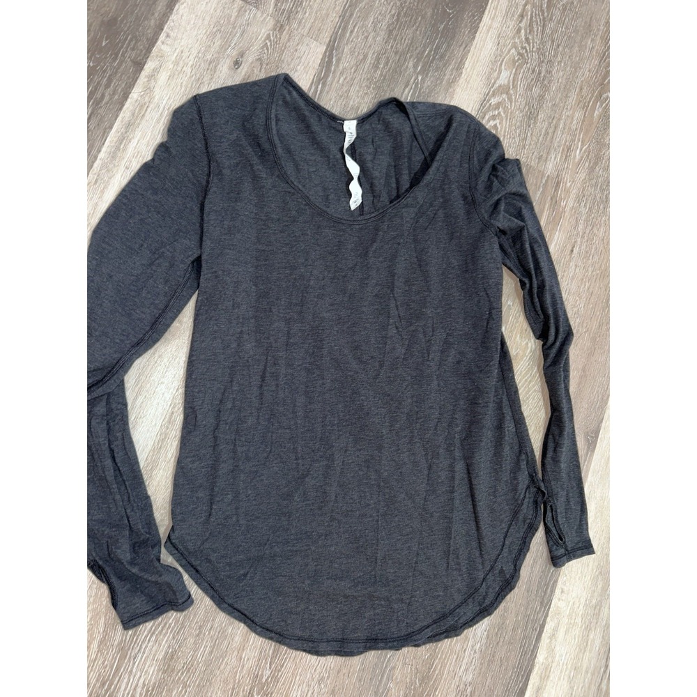 Lululemon Yogini 5 Year Long Sleeve Tee in the color Heathered Black Size 6